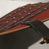 Striped Red and Black Leg Armour