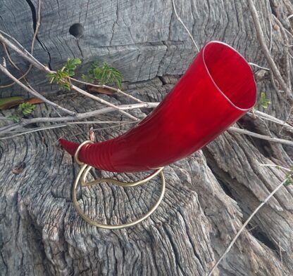Red drinking horn with stand